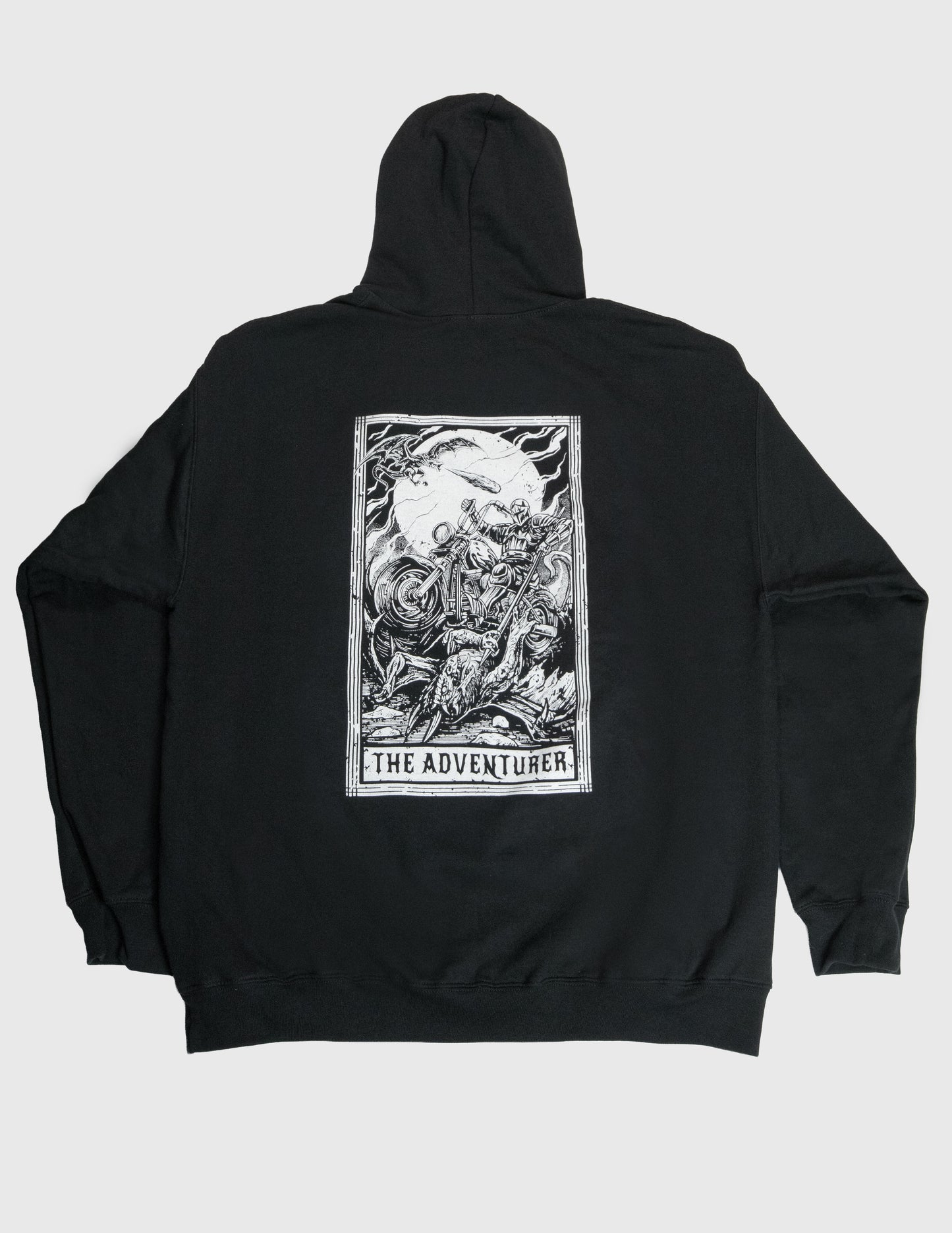 Black hoodie with 'The Adventurer' tarot card design on the back against a white background. Dragon, Knight, Motorcycle, Mythic Moto. Her Two Wheels