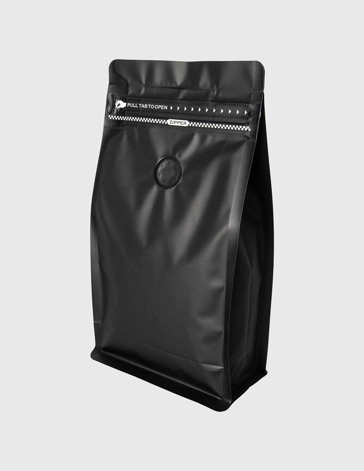 Black coffee bag with a brand logo on a light gray background