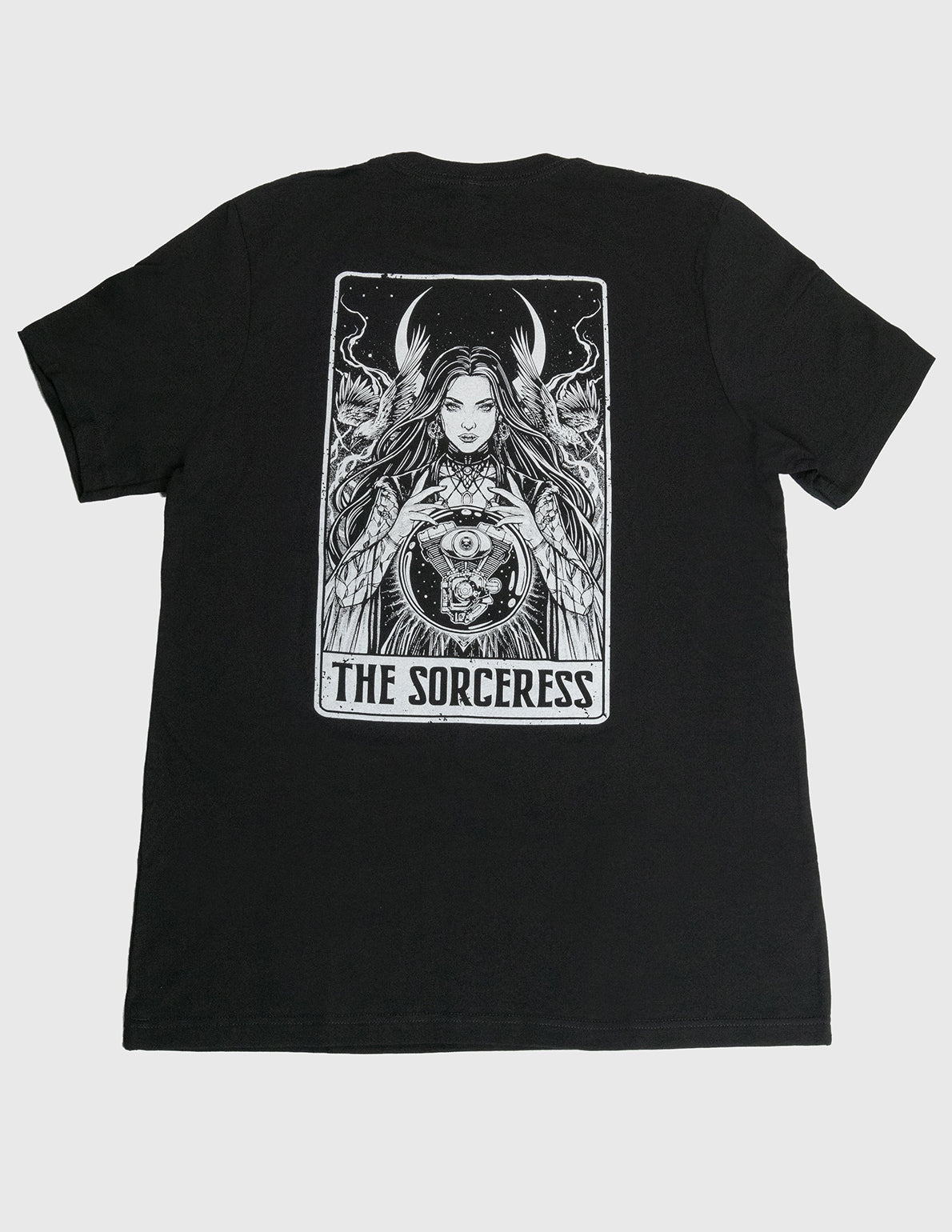 Black t-shirt with 'The Sorceress' graphic design on a white background. Her Two Wheels